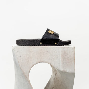 Pisina means "Pool" | Black handmade leather vibram resort slide with gold coinage and brass accents.