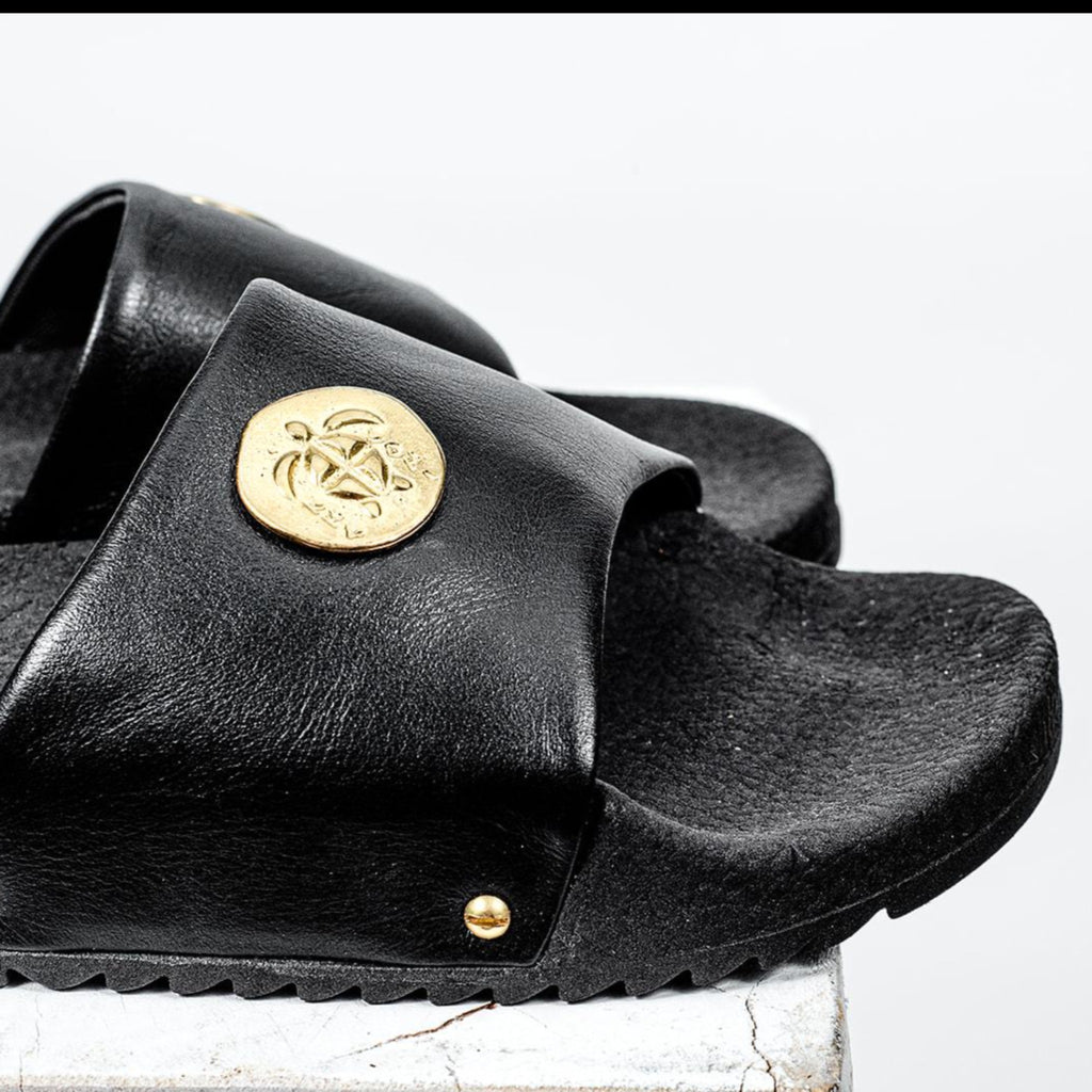 Pisina means "Pool" | Black handmade leather vibram resort slide with gold coinage and brass accents.