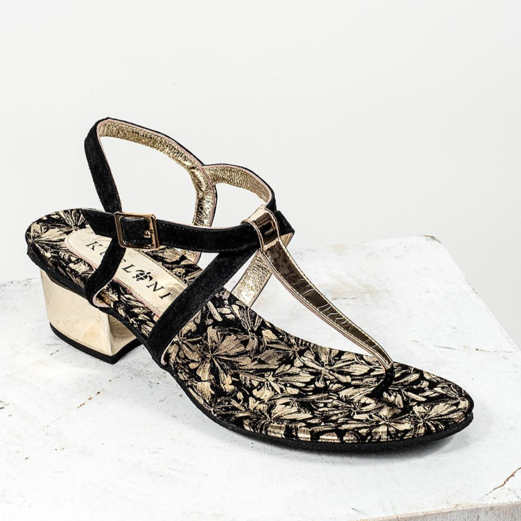 Handmade Greek sandal with a platinum heel and a touch of gold